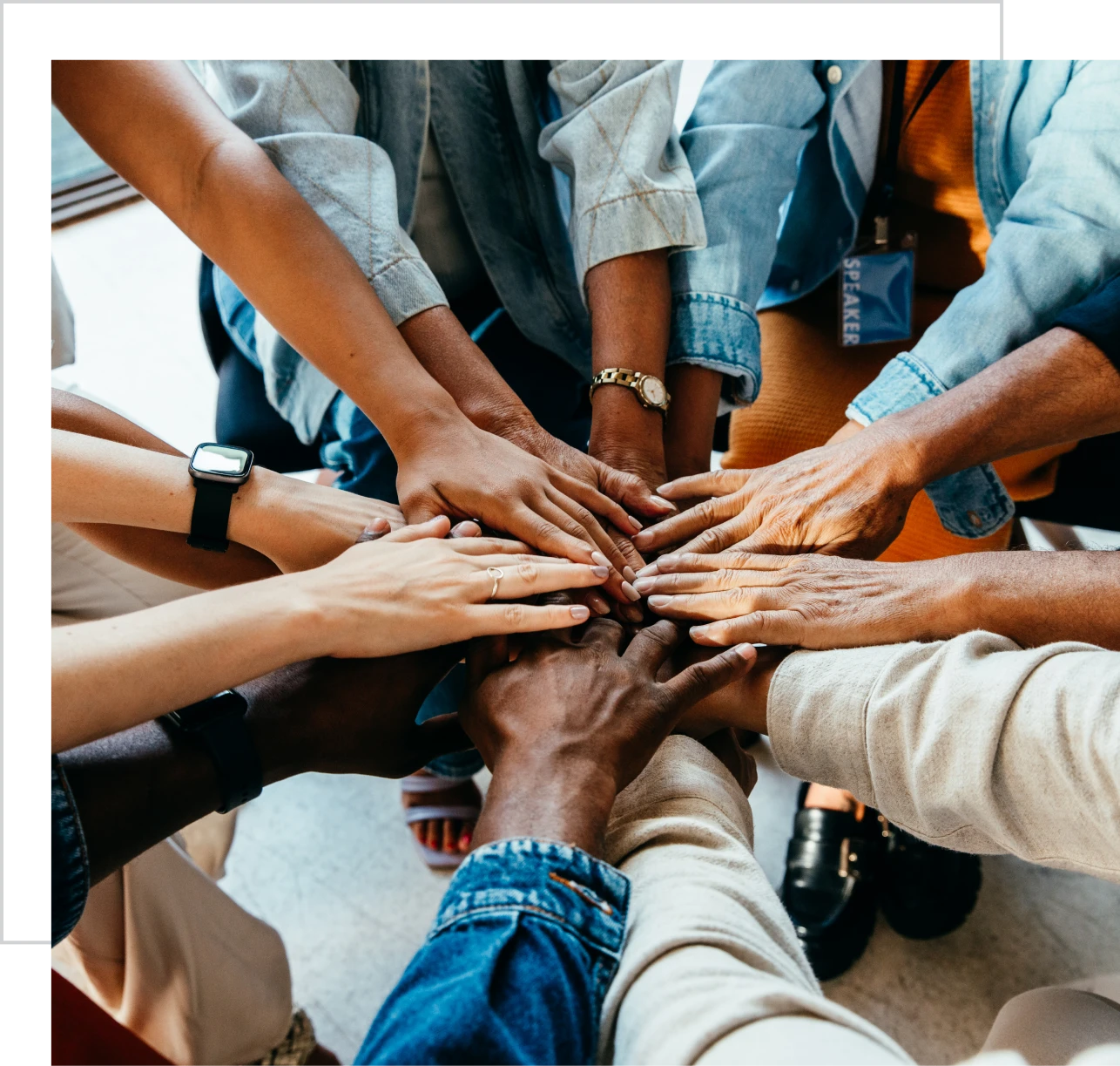 Diverse hands joined in unity